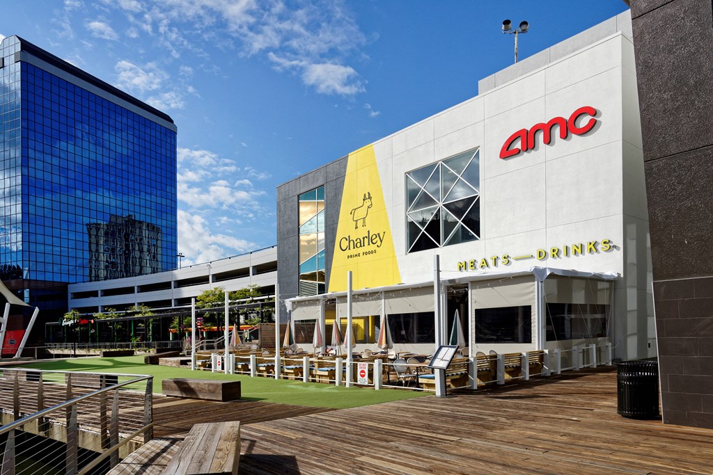 a large white building with a large yellow sign on the side of it