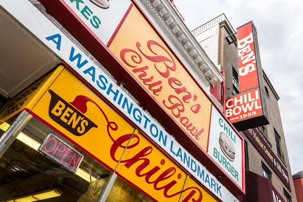 a row of neon signs on the side of a building at The Shay, Washington