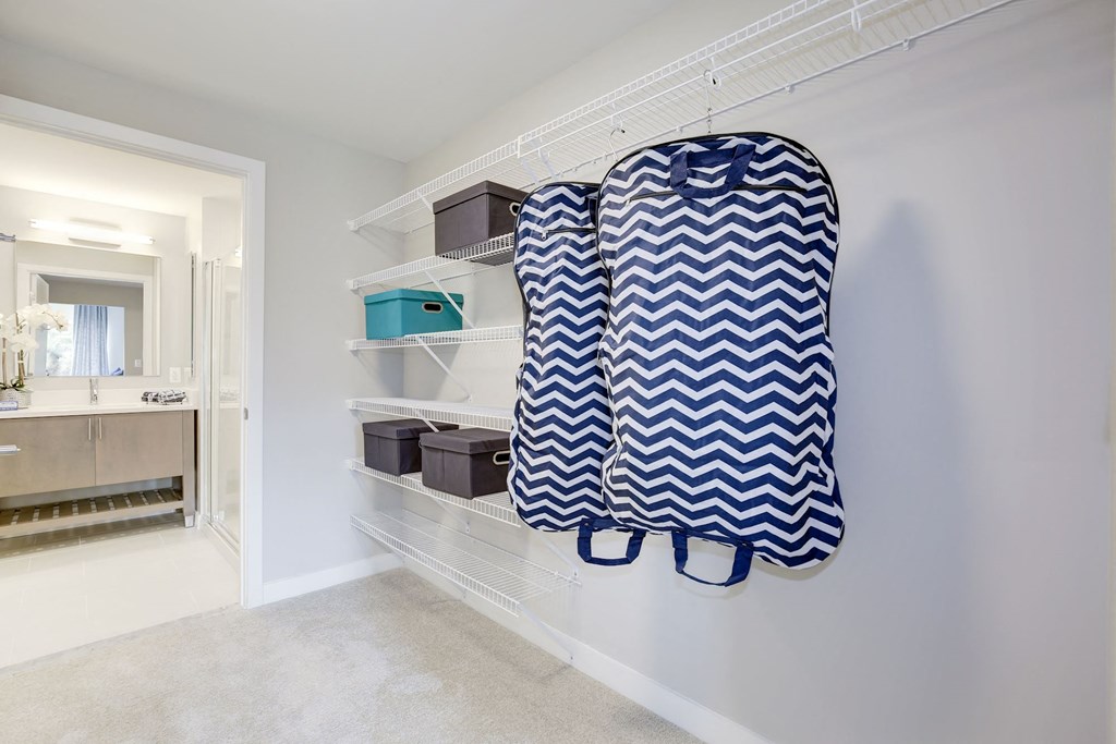 One-bedroom closet and bathroom at Valo Apartments, District of Columbia 20024