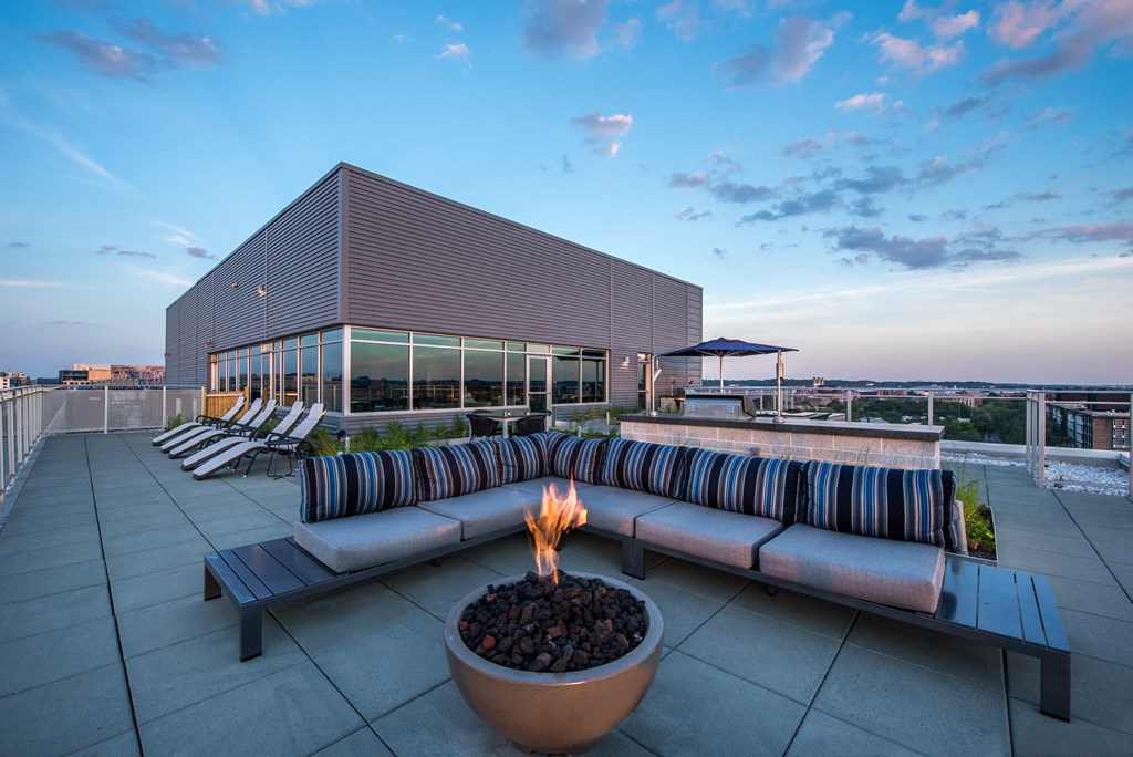 Rooftop deck with fire pit and grills at Valo Apartments, DC 20024