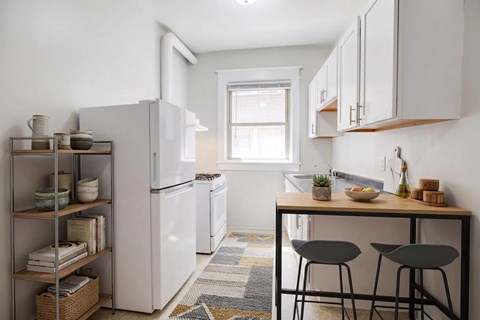 Kitchen (virtually staged) at 4115 Wisconsin Avenue Apartments in the Tenleytown neighborhood in Washington, DC 20016