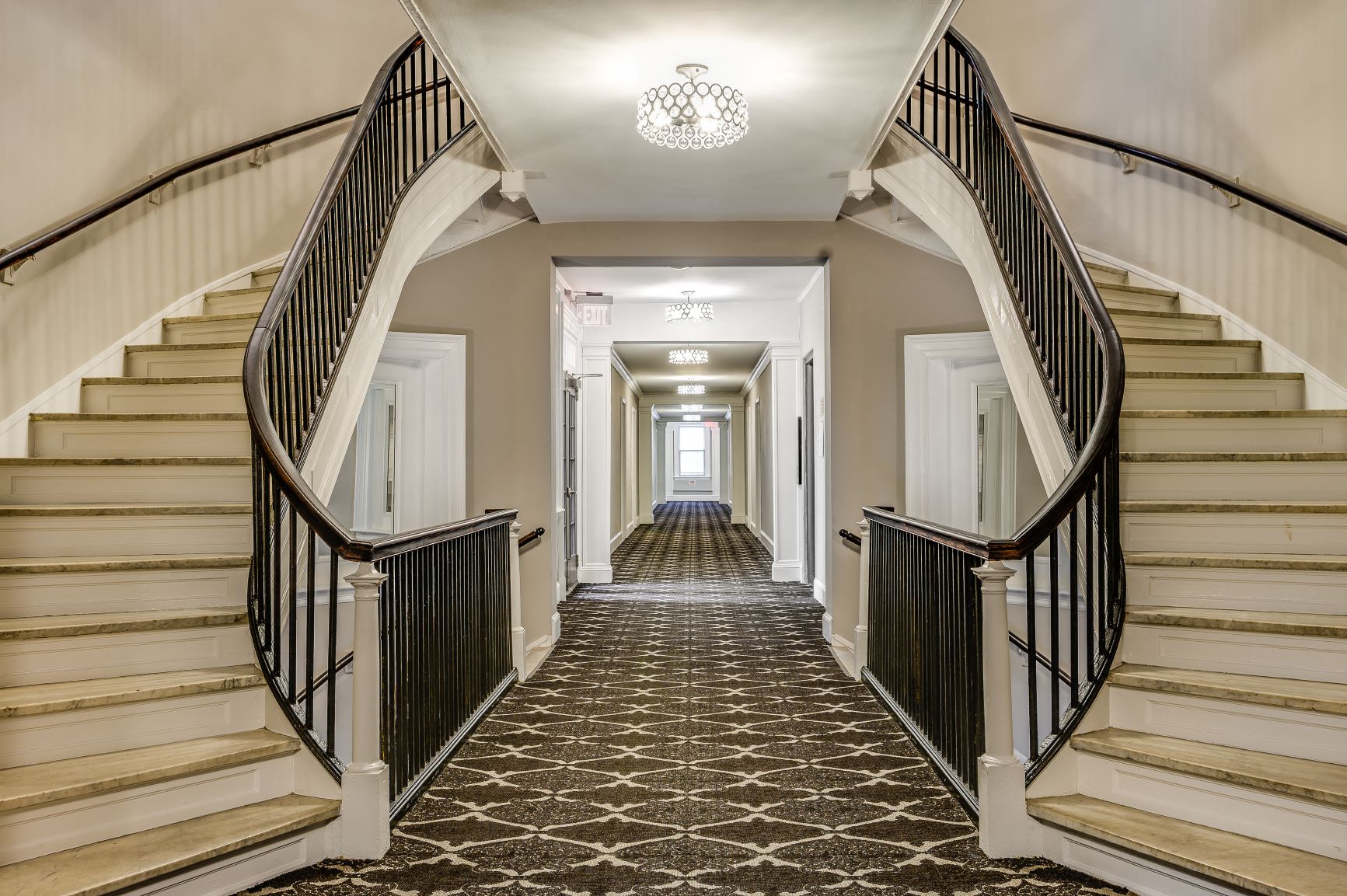 Hallway with grand staircase at President Madison, Washington, DC