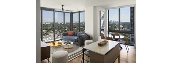 A modern living room with a view of the city.
