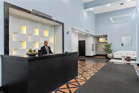 A reception area with a black and white color scheme.