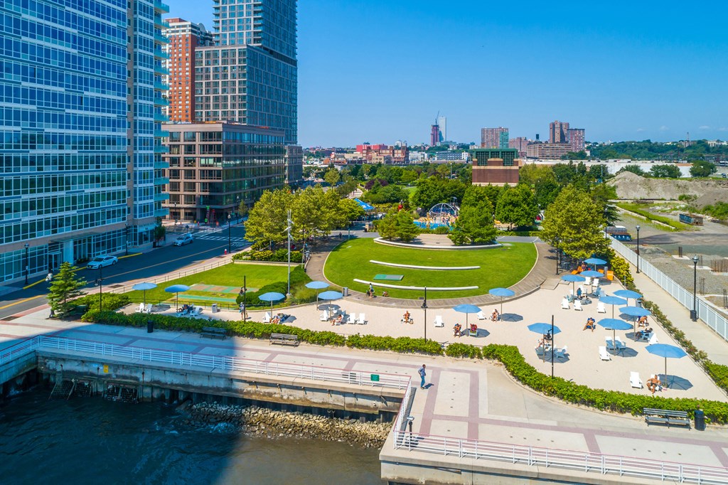 Waterfront park with sandy urban beach