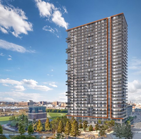 a tall skyscraper in the middle of a city