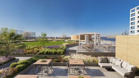 a rendering of a rooftop terrace with a couch and tables