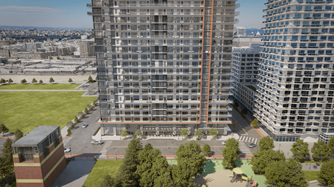 an aerial view of a city with tall buildings and a park