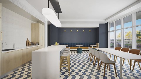 a dining room with a long white table and chairs