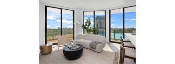 A modern living room with a view of the city.