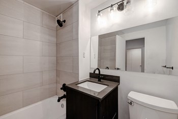 Quebec House dark renovated bathroom Quebec House dark renovated bathroom