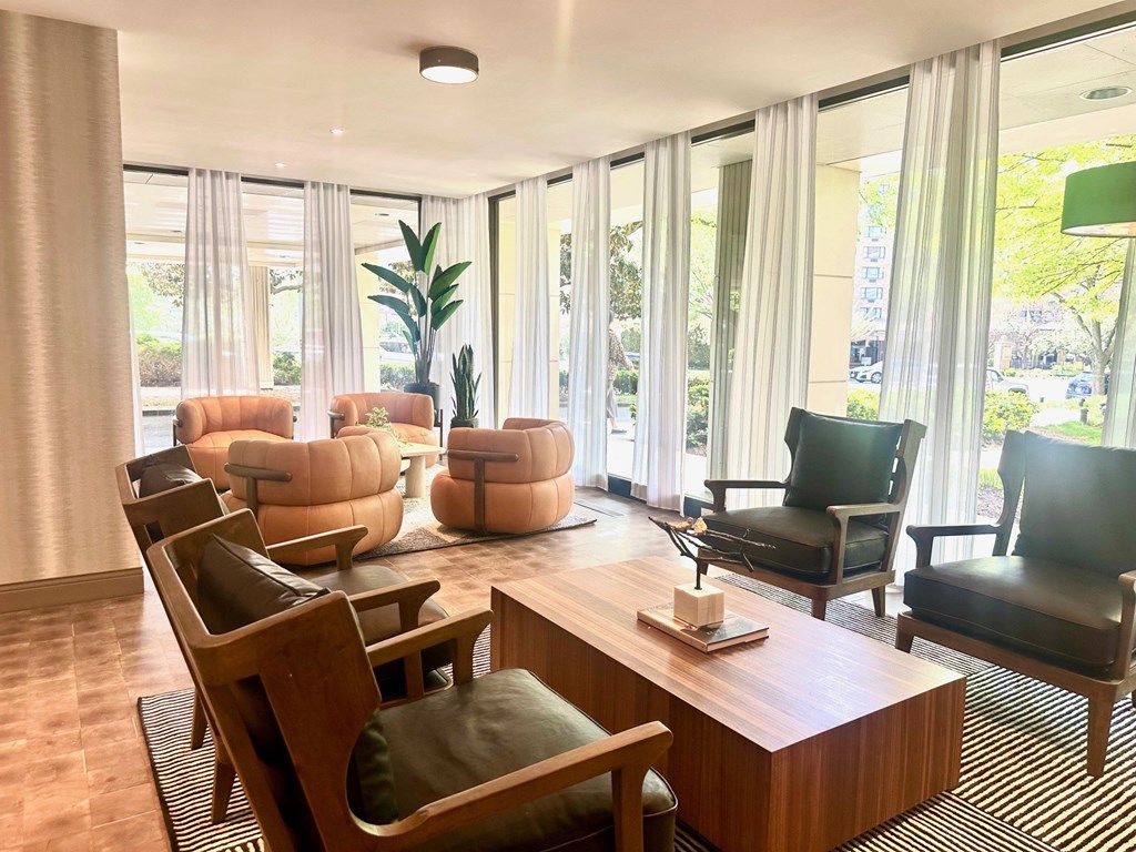 A room with a long table and chairs at Calvert House Apartments, Washington, DC 20008