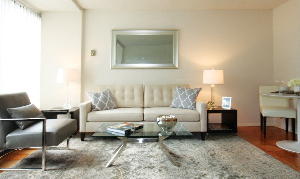 a living room with a couch and a table