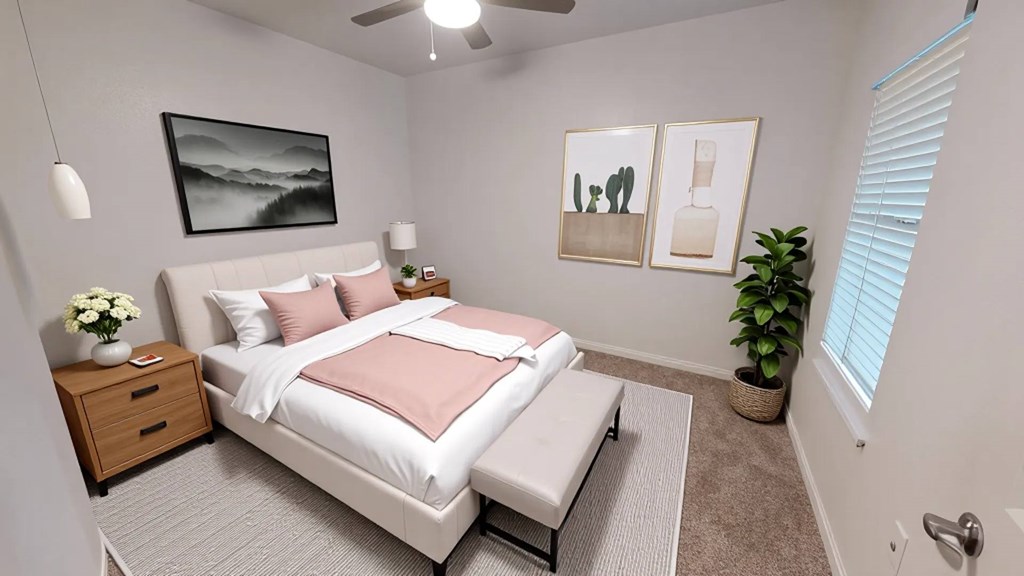 A bedroom with a bed, nightstand, and a plant.