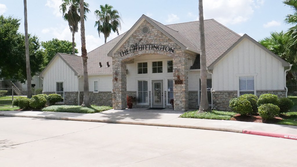 The front of a building with the name "The Christening" on it.