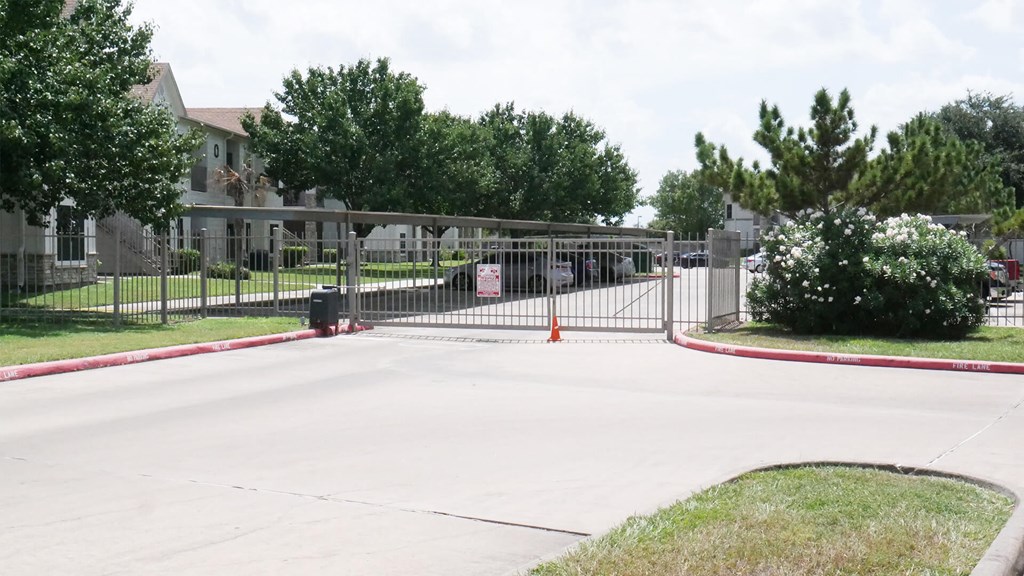 A gated entrance to a residential area.