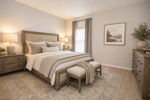 A bedroom with a large bed, a bench, and a painting on the wall.
