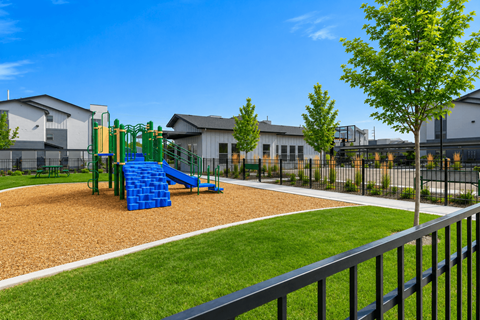 Playground with slide and fitness court at Silver Ridge Apartments, Idaho