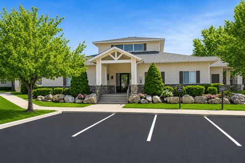 A house with a driveway in front of it.