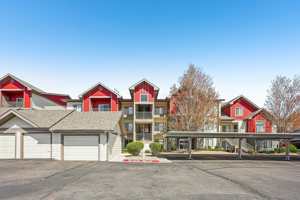 A row of houses with a clear blue sky above them. at Stetson Meadows Apartments, Colorado, 80922