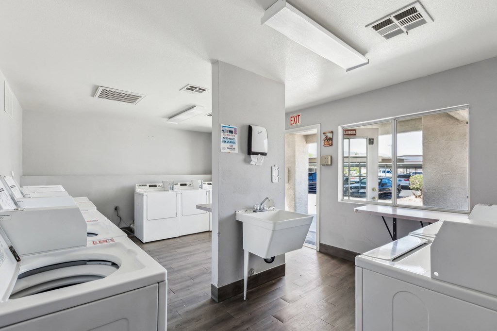 the preserve at ballantyne commons laundry room with washer and dryer