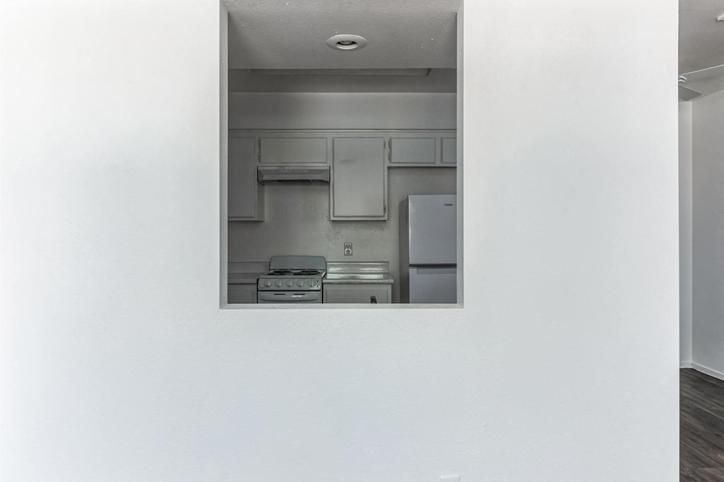 a view of a kitchen from a window