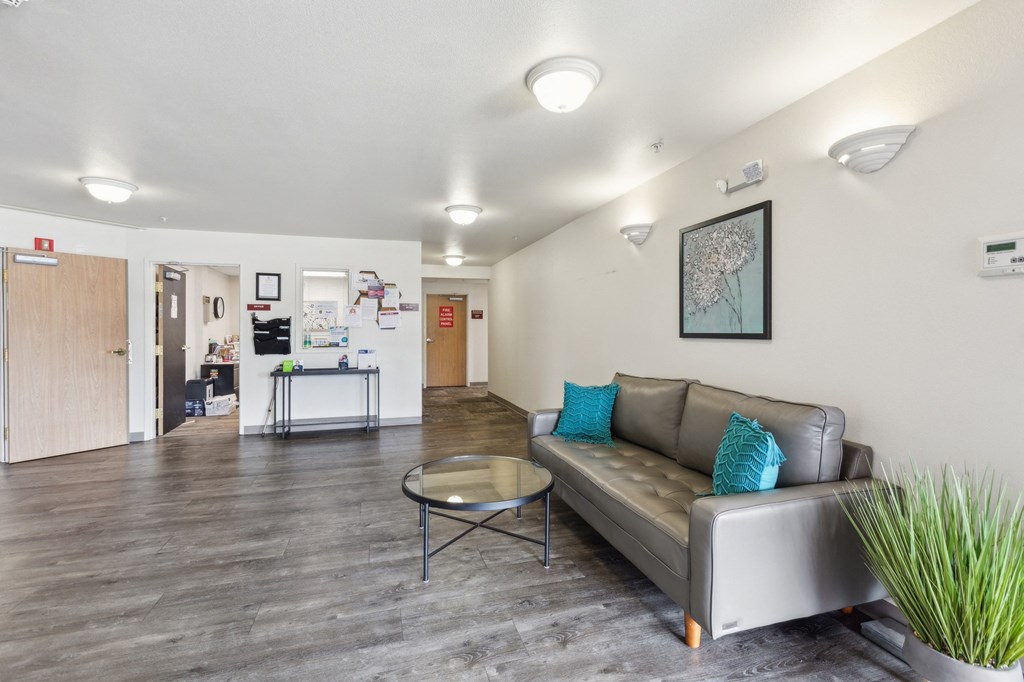 a living room with a couch and a coffee table