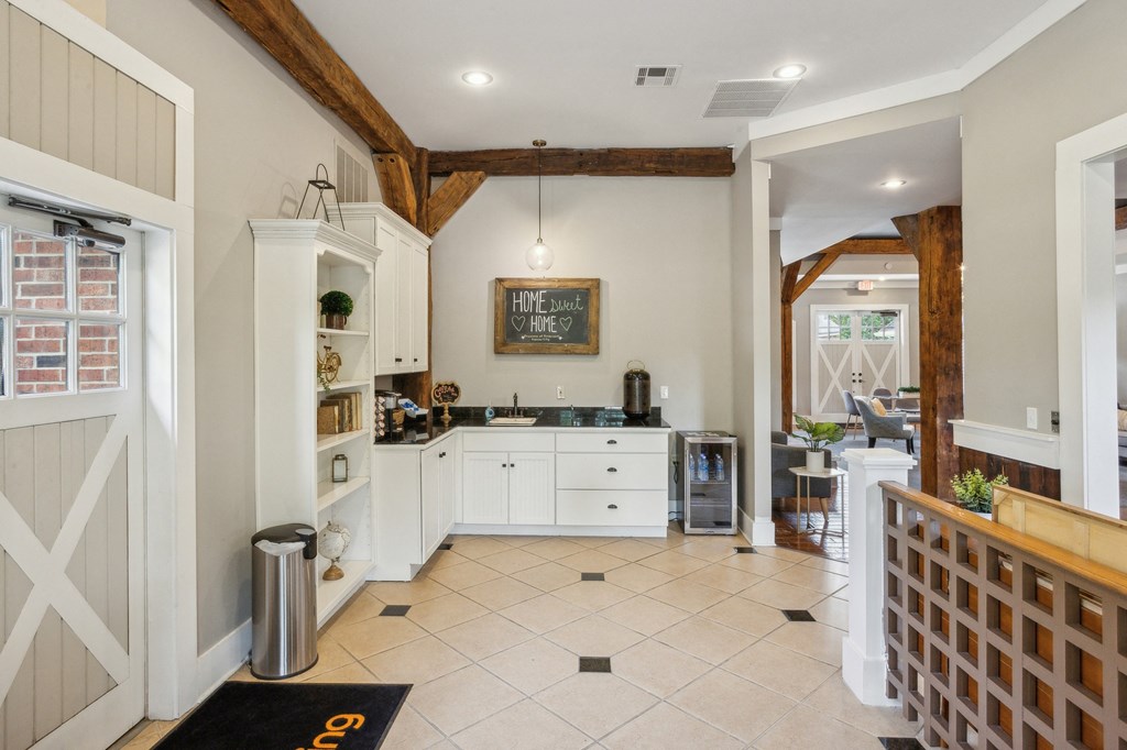 the kitchen is open to the dining room and living room at Province of Briarcliff Apartments, Kansas City, Missouri