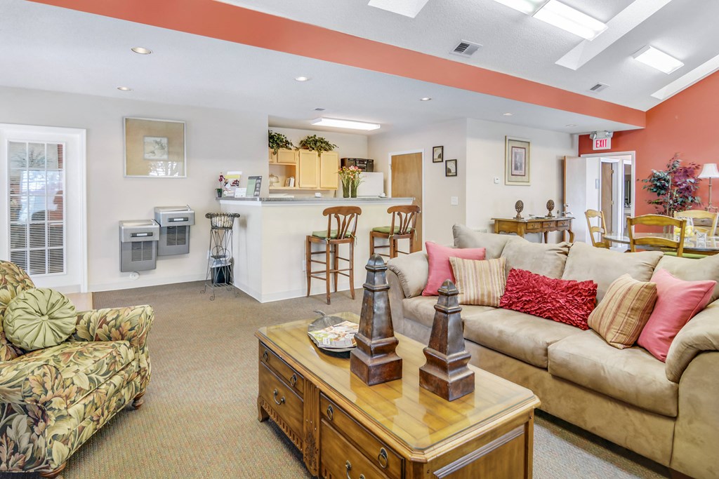 a living room with couches and a coffee table