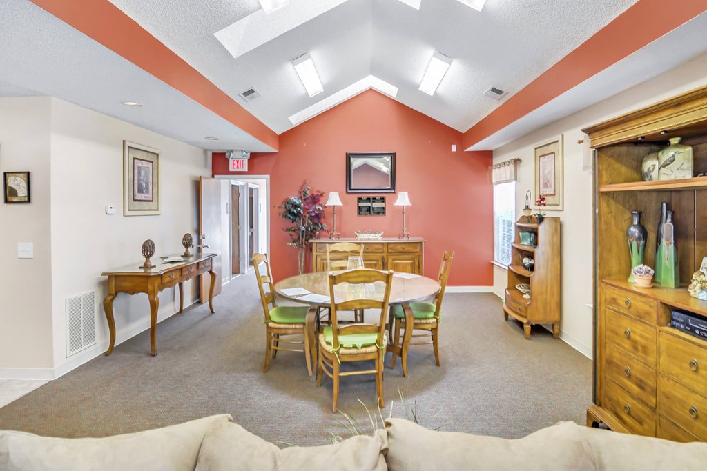 the dining room is open to the living room and kitchen