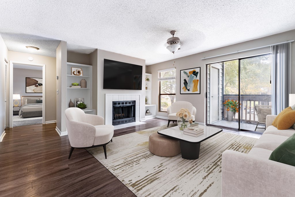 A modern living room with a fireplace and a television.