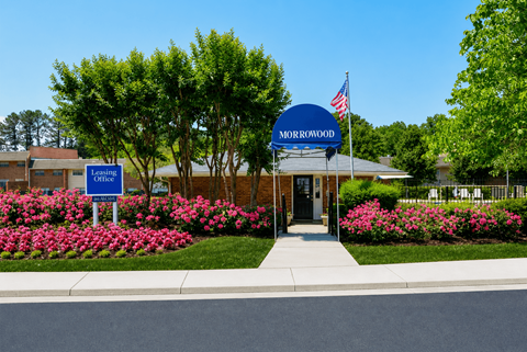 The image shows a building with a sign that reads "Morrowood" and an American flag on top.
