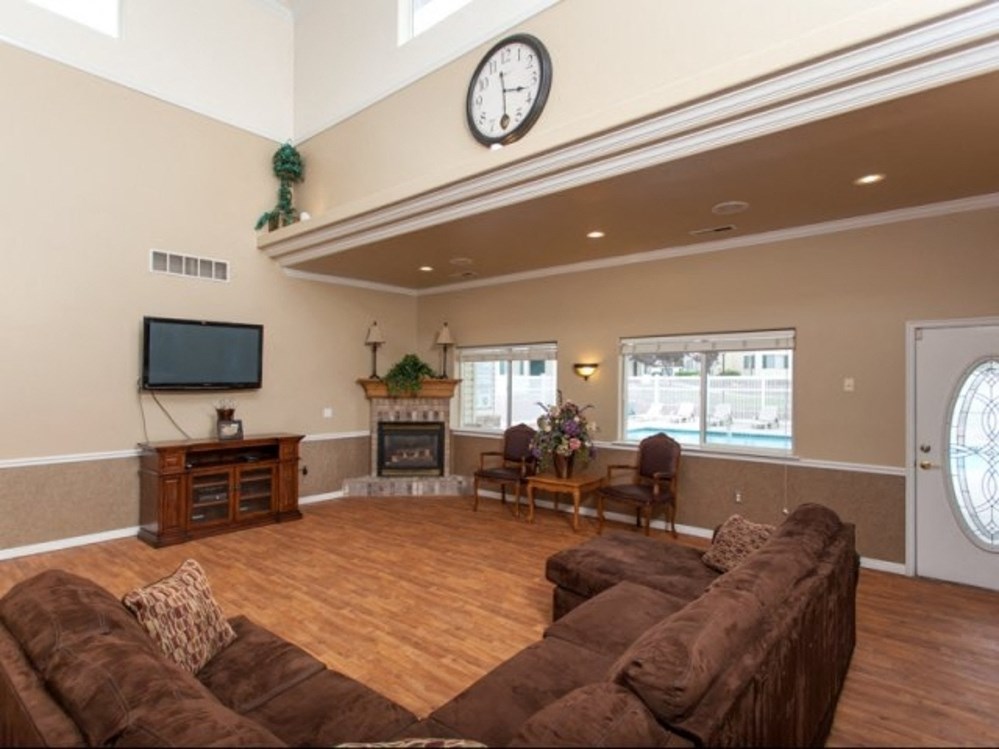 a living room with a couch and a tv