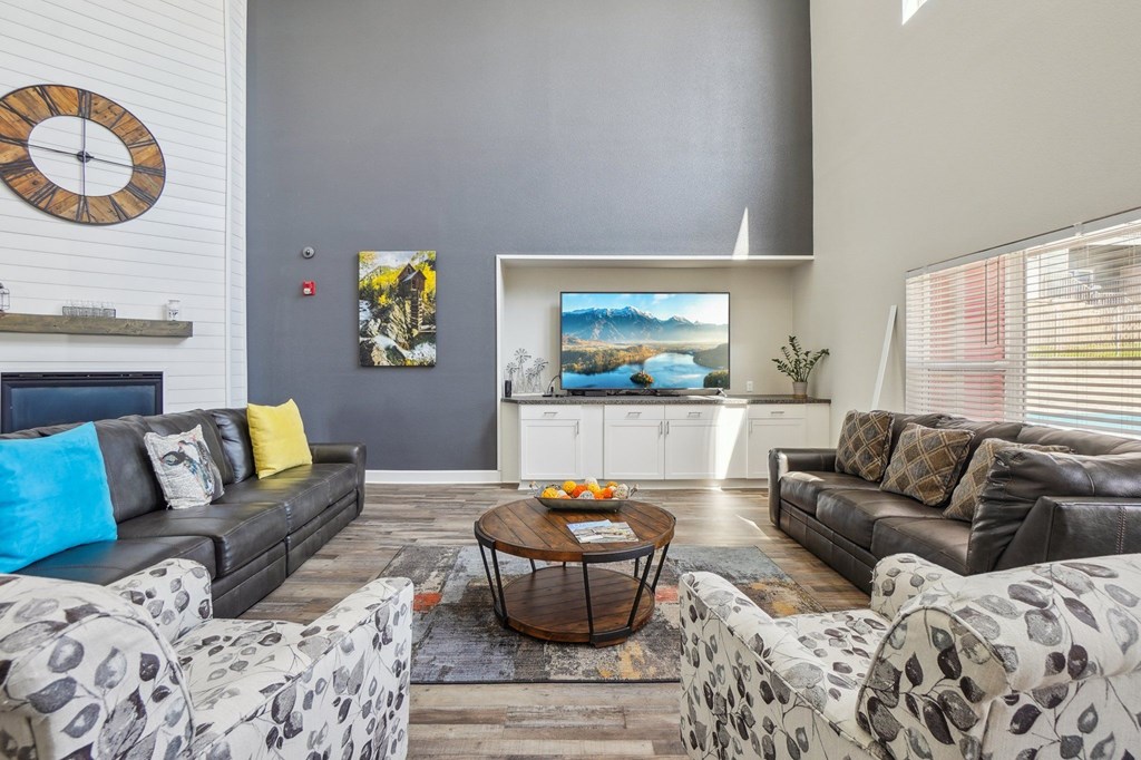 A living room with a grey couch and a coffee table. at Stetson Meadows Apartments, Colorado Springs, CO, 80922