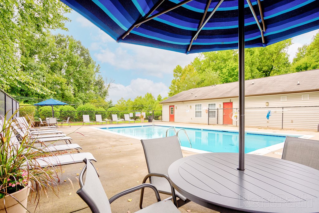 our apartments have a swimming pool and patio furniture