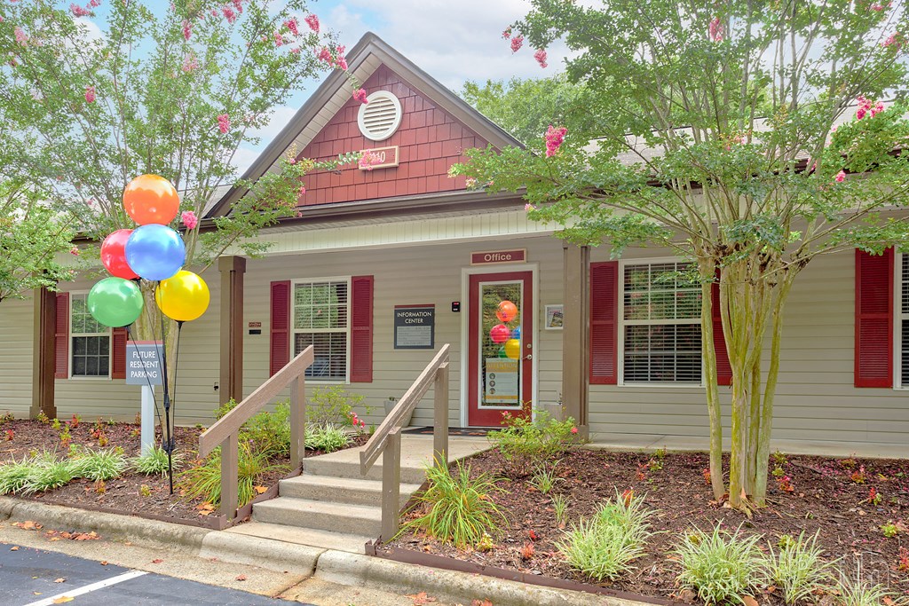 a house with balloons in front of it