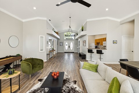 a living room with a couch and a table