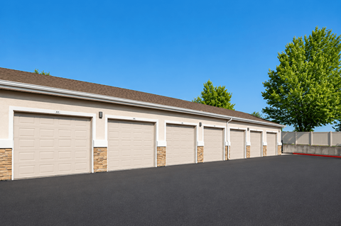 A row of garage doors are closed.