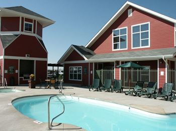 the pool is in front of the building at Stetson Meadows Apartments, Colorado Springs, CO