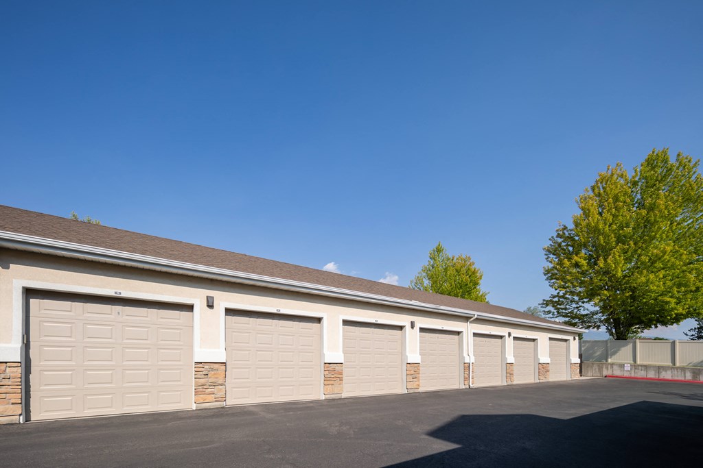 A row of garage doors are closed.