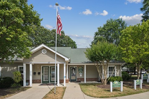 a building with an flag in front of it