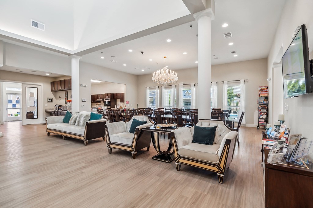 a large room with many mirrors on the wall and a wooden floor
