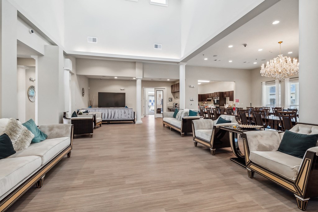 the living room and dining room of a new home