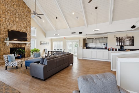 a living room with a fireplace and a couch