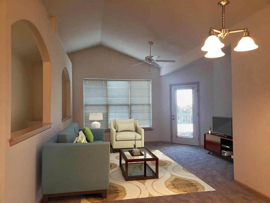 a living room with a couch and a chair.