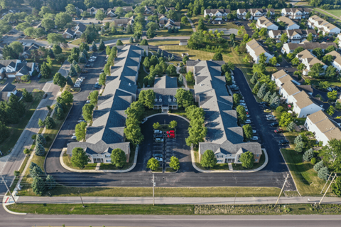 an aerial view of a group of houses in a suburb