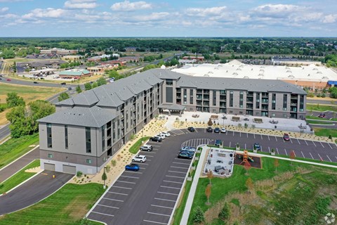 an aerial view of an office building and parking lot