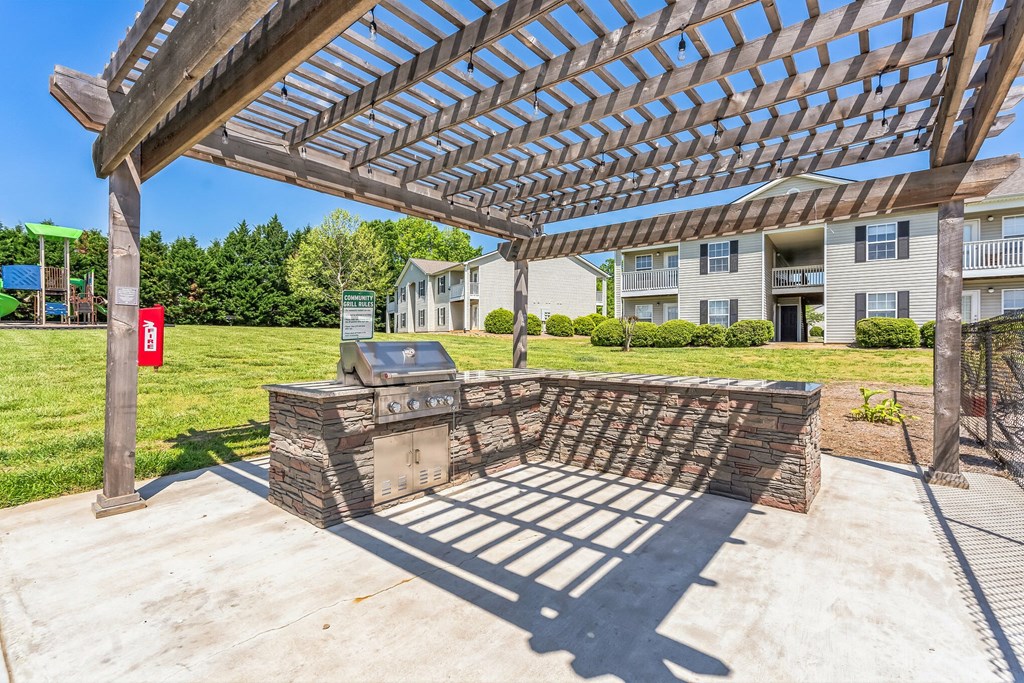 the preserve at ballantyne commons covered patio with grill and pergola