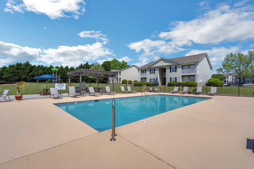 the preserve at ballantyne commons community swimming pool with house in the background