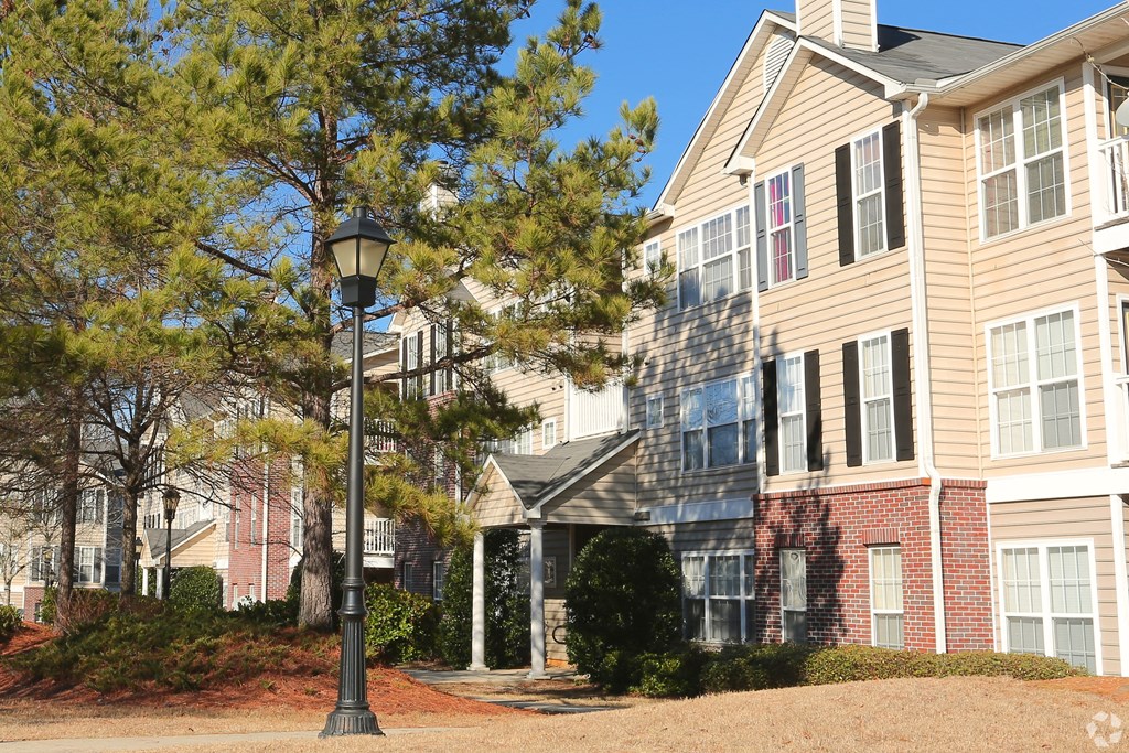 a building with a street light in front of it